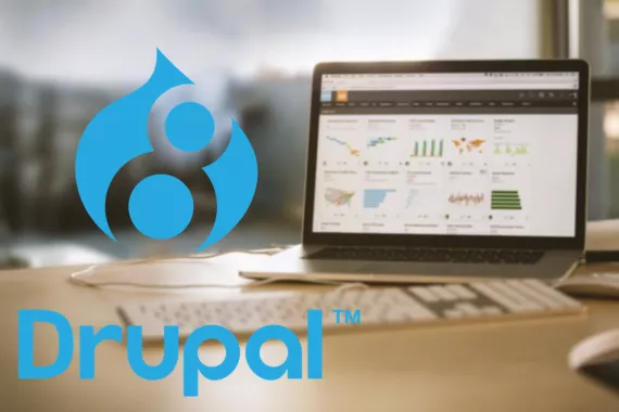 Drupal Logo mit Laptop im Hintergrund